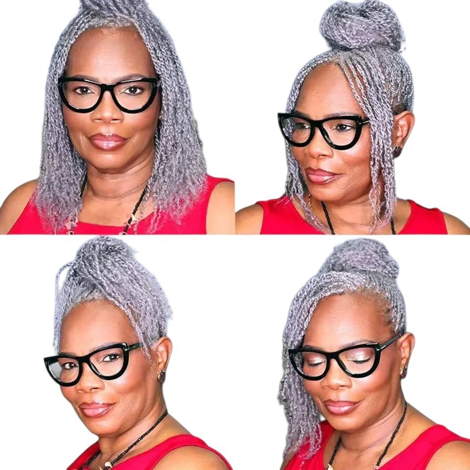 RitzWigs afro kinky grey human hair extensions styled in various twists and a top knot on a woman wearing glasses