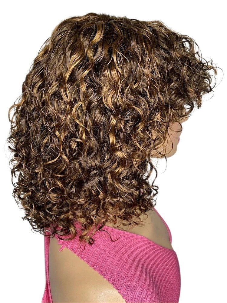 RitzWigs honey blonde ombre curly pixie bob human hair wig with bangs on a mannequin