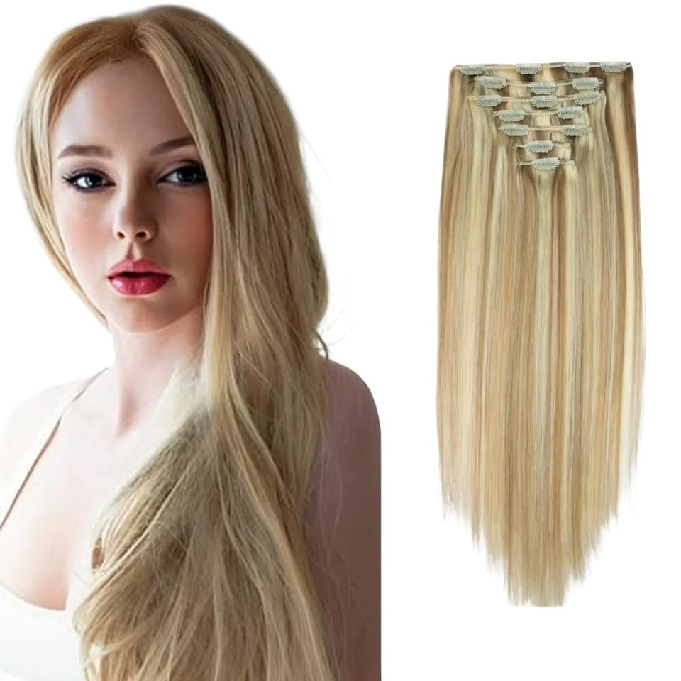 RitzWigs honey blonde straight human hair clip-in extensions worn by a model for a natural voluminous look