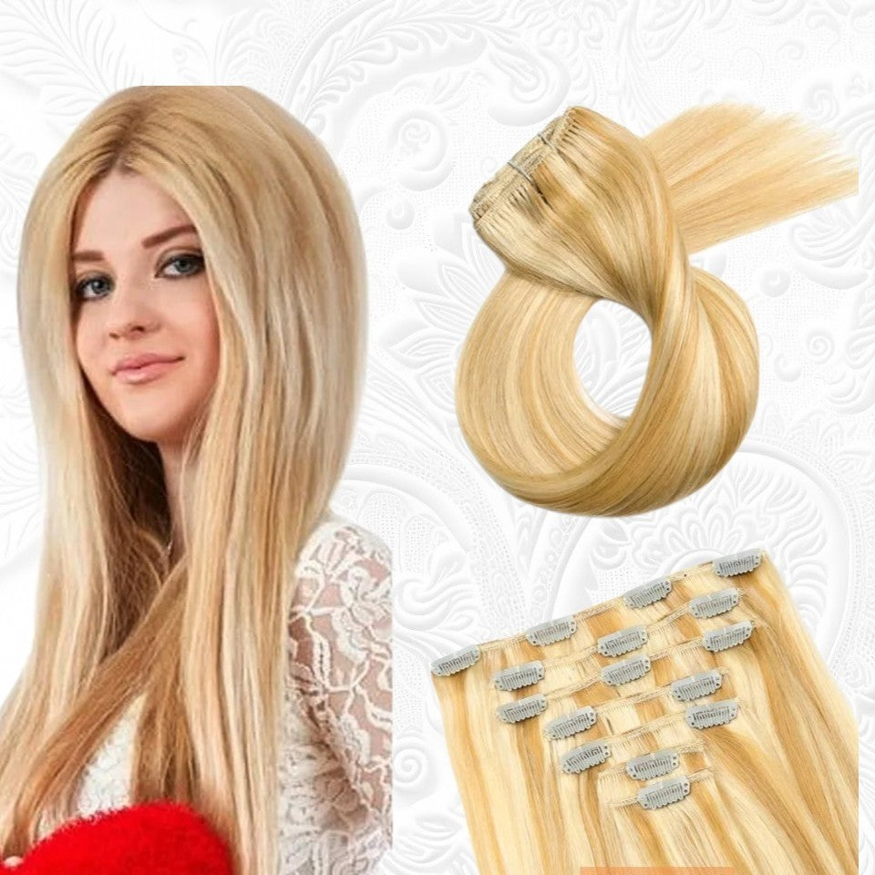 RitzWigs honey blonde straight human hair clip-in extensions set on a model with a white lace top