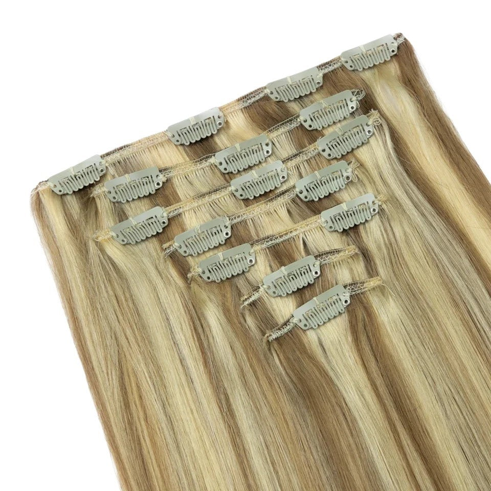RitzWigs honey blonde straight human hair clip-in extensions with secure metal clips for easy application