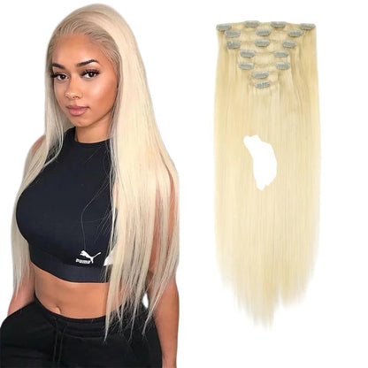 RitzWigs honey blonde straight human hair clip-in extensions set on a model with long sleek hair