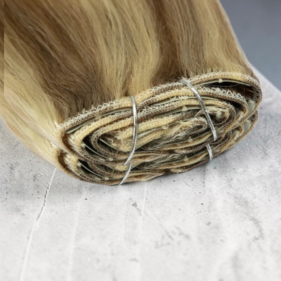 RitzWigs honey blonde straight human hair extensions with secure clips in a 7-piece set