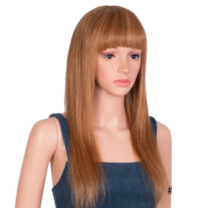 RitzWigs honey blonde straight human hair wig with bangs on a mannequin, featuring a natural highlight colour blend.