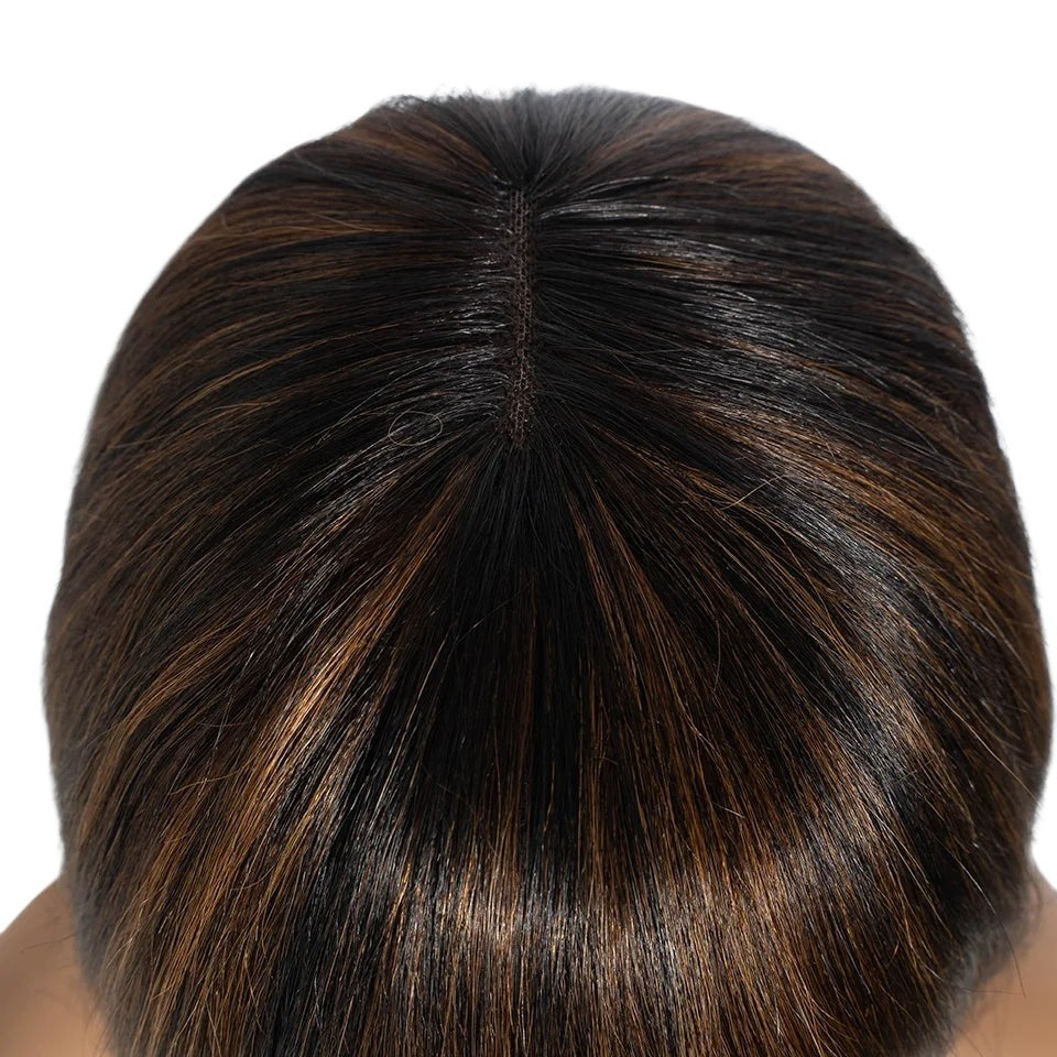RitzWigs Brazilian Remy human hair bob wig with a natural-looking middle part and Swiss lace scalp detail.