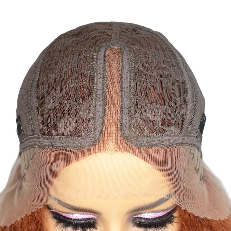 RitzWigs human hair lace wig cap construction with transparent Swiss lace and middle part detail on a mannequin head