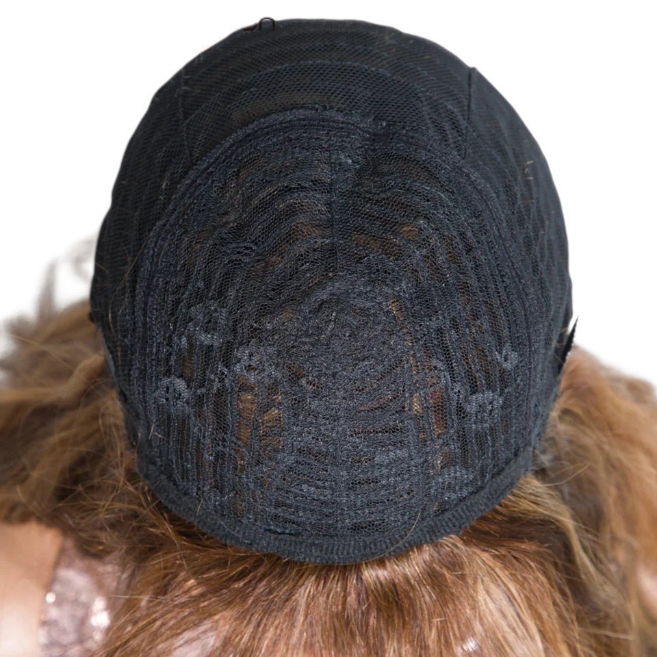 RitzWigs Brazilian human hair wig cap construction showing the breathable black mesh interior and adjustable straps