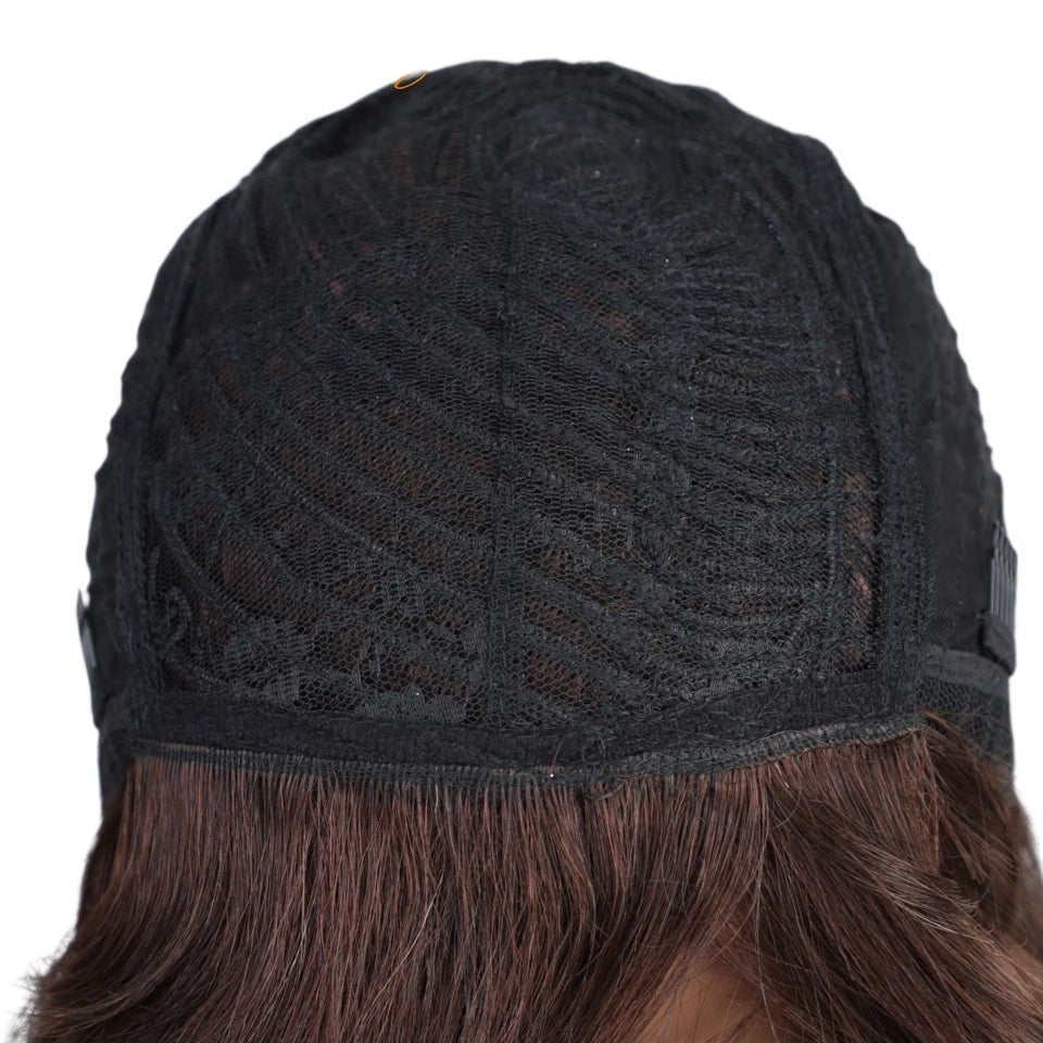 RitzWigs human hair wig interior showing the black lace cap construction and brown hair strands