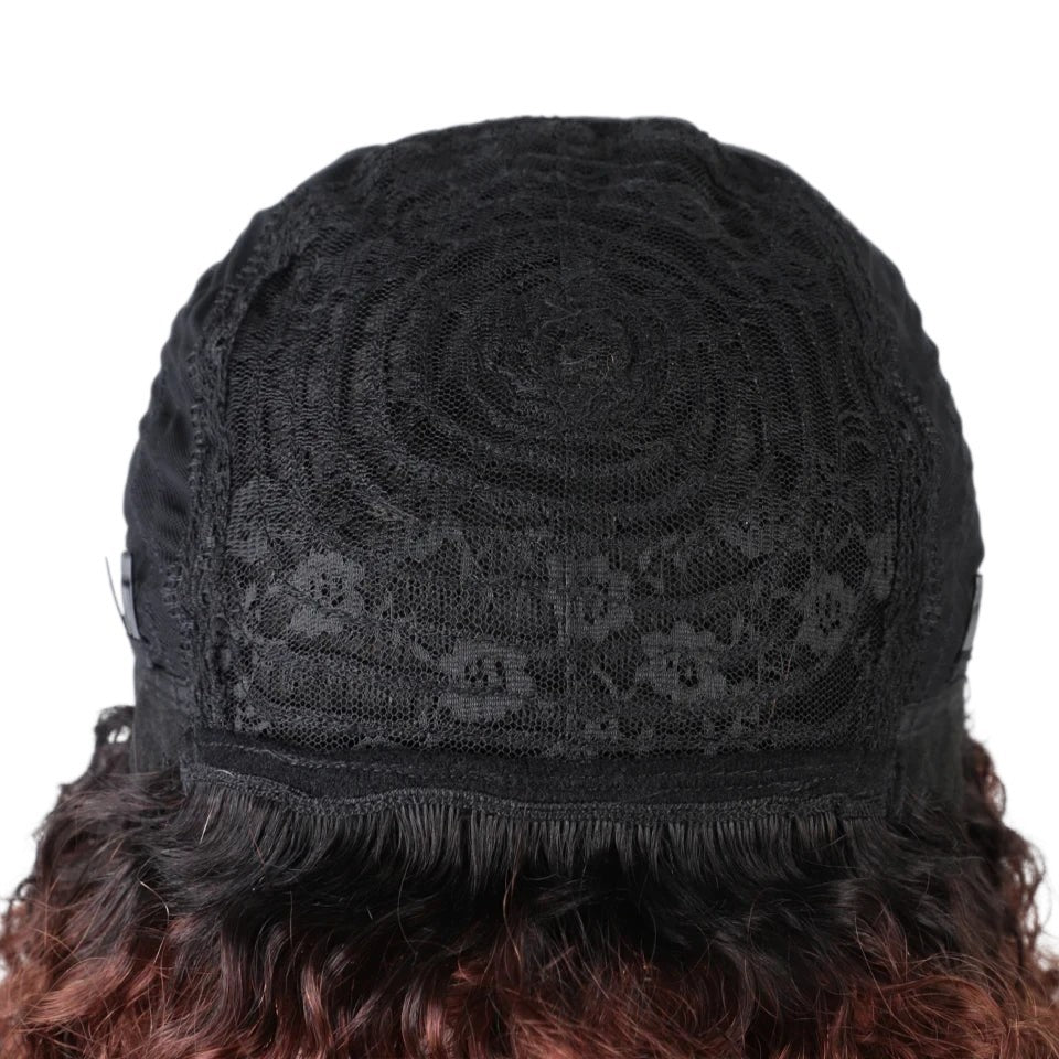 RitzWigs human hair wig cap interior showing black lace construction and adjustable straps for a secure fit