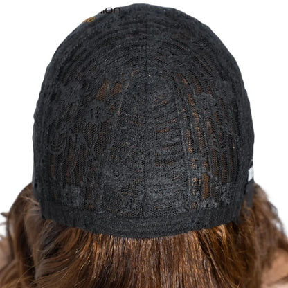 RitzWigs short body wave human hair wig interior showing the breathable black lace cap construction