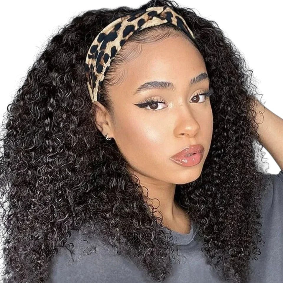 RitzWigs kinky curly human hair headband wig with a leopard print headband worn by a woman