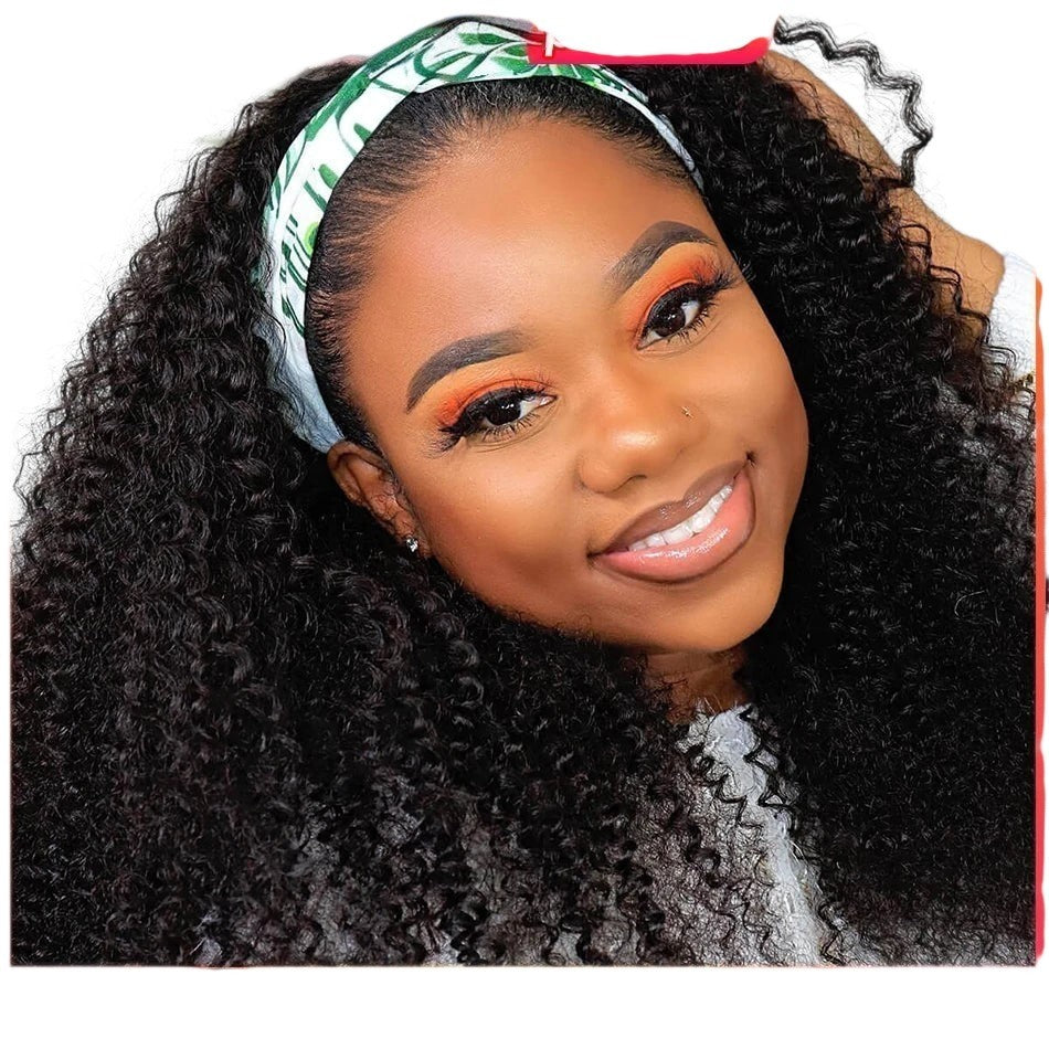RitzWigs kinky curly human hair headband wig on a woman wearing a green patterned headband