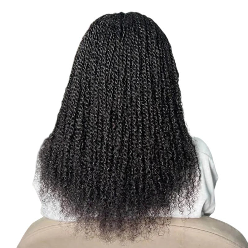 RitzWigs natural black human hair with kinky curly texture styled in long twists on a person from behind