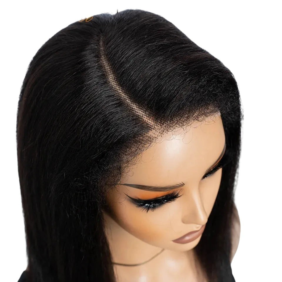 RitzWigs 14-inch kinky straight human hair bob wig with a side part and transparent lace on a mannequin head