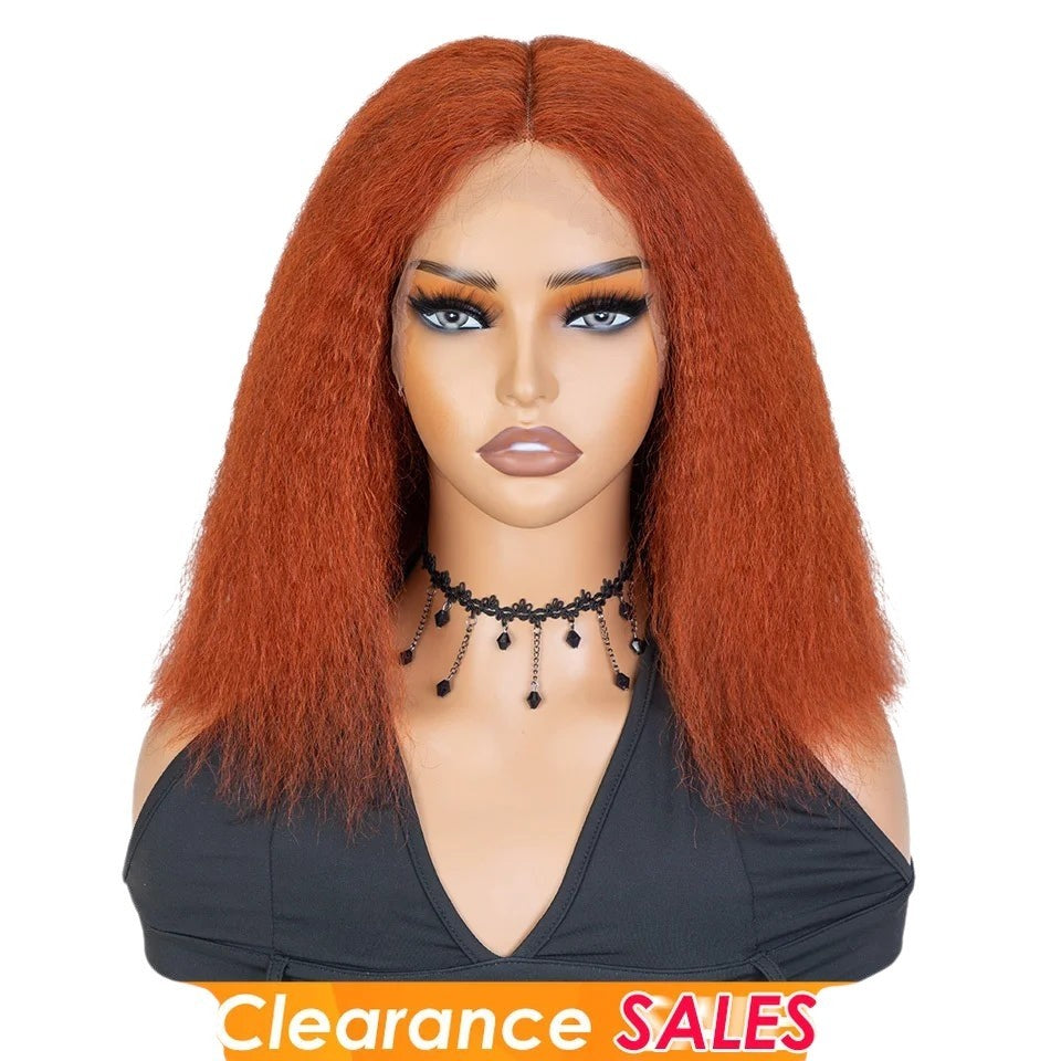 RitzWigs kinky straight human hair bob wig in vibrant copper orange with a middle part and pre-plucked lace front.