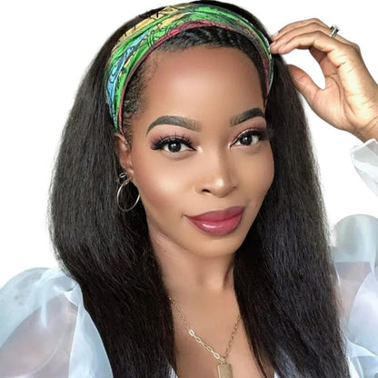 RitzWigs 22-inch kinky straight human hair headband wig worn by a woman with a colourful patterned headband
