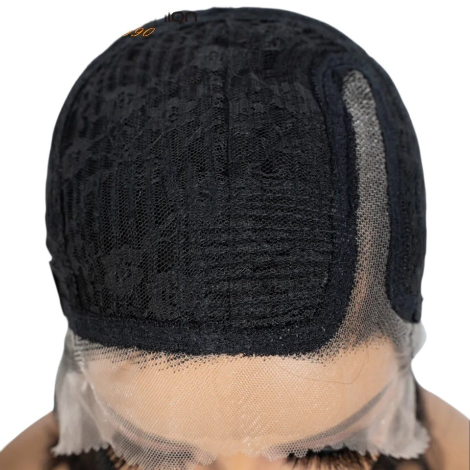 RitzWigs human hair bob wig cap interior showing Swiss lace front construction and adjustable straps
