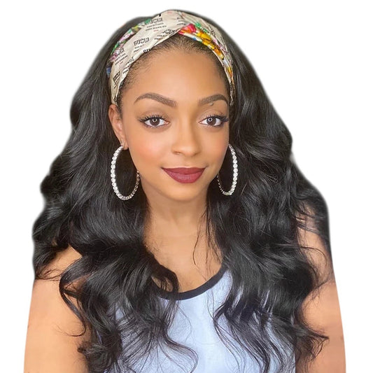 RitzWigs long black body wave human hair wig with a patterned headband worn by a woman with large hoop earrings