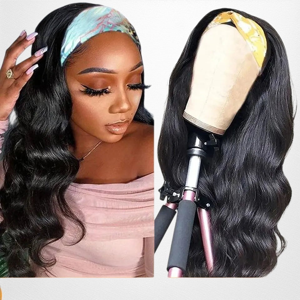 RitzWigs long black body wave human hair headband wig worn by a model and displayed on a mannequin head