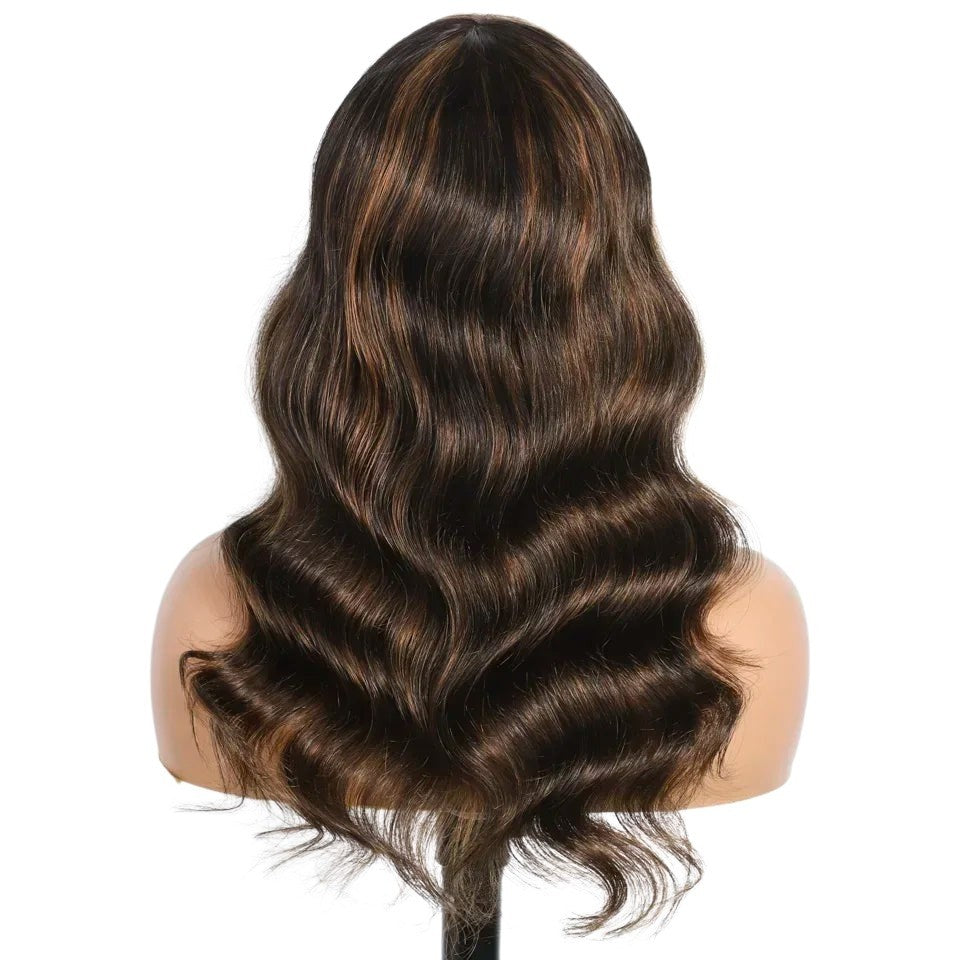 RitzWigs ombre blonde highlight body wave human hair wig on a mannequin head, showing long wavy texture from the back.