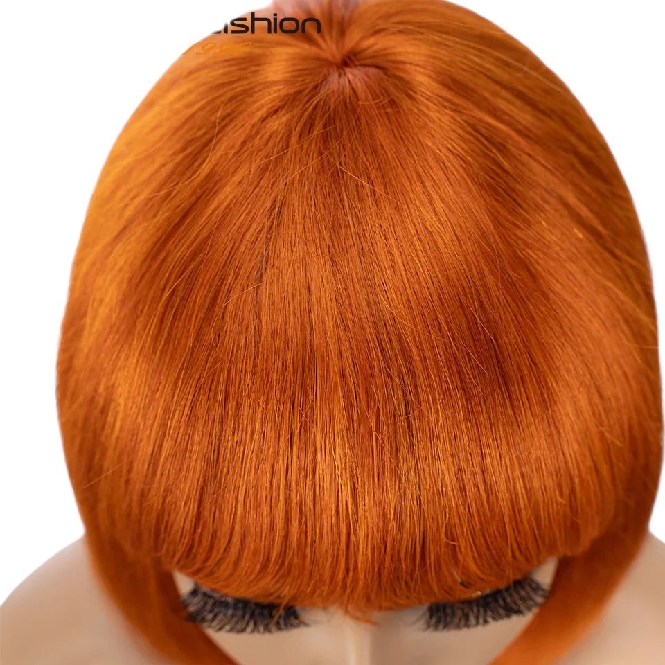RitzWigs orange ginger straight human hair bob wig with bangs on a mannequin head