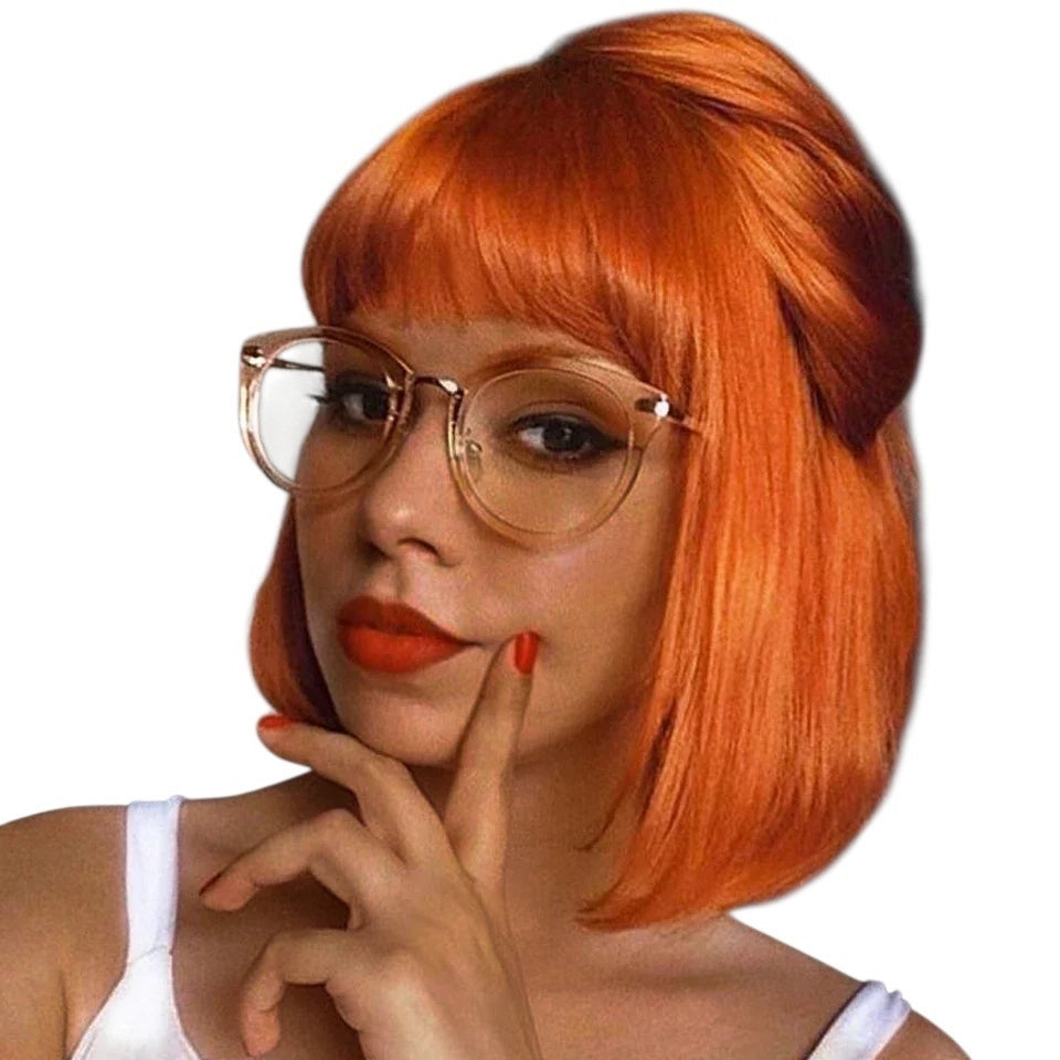 RitzWigs bright orange straight bob wig with bangs worn by a woman with glasses