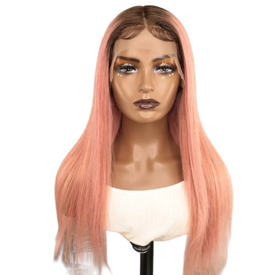 RitzWigs pink straight human hair lace front wig with dark roots and a middle part on a mannequin head.