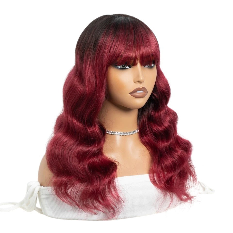 RitzWigs 22-inch body wave human hair wig with bangs in T1B purple ombre on a mannequin head