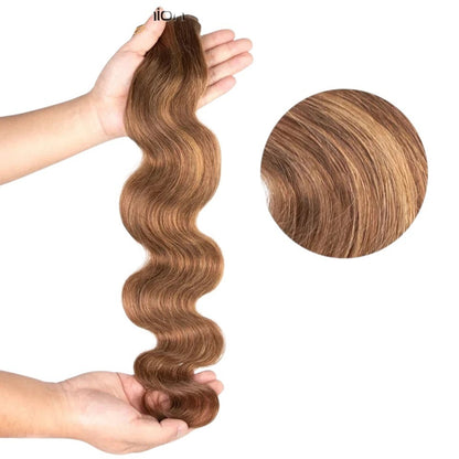 RitzWigs Rebecca Youth human hair bundle in P6/27 brown highlight body wave texture held in hands