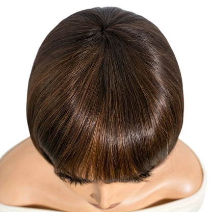 RitzWigs Rebecca Youth short straight human hair bob wig with bangs, top view showing natural dark brown hair texture