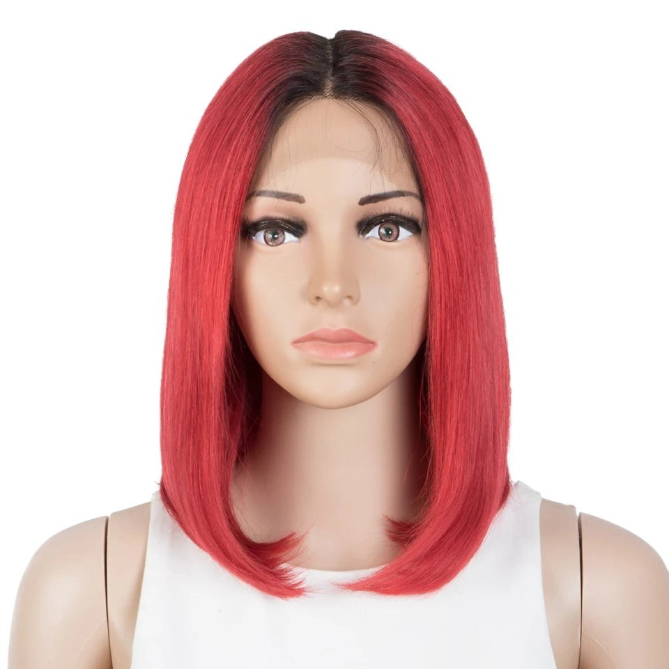 RitzWigs short straight bob wig with dark roots and vibrant red human hair on a mannequin head