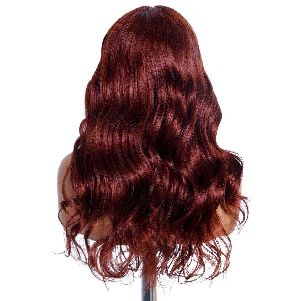RitzWigs reddish brown body wave human hair lace front wig on a mannequin head