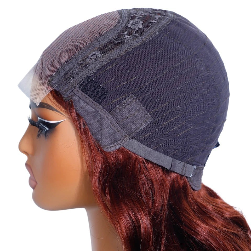 RitzWigs reddish brown body wave human hair lace front wig on a mannequin head showing the inner cap construction