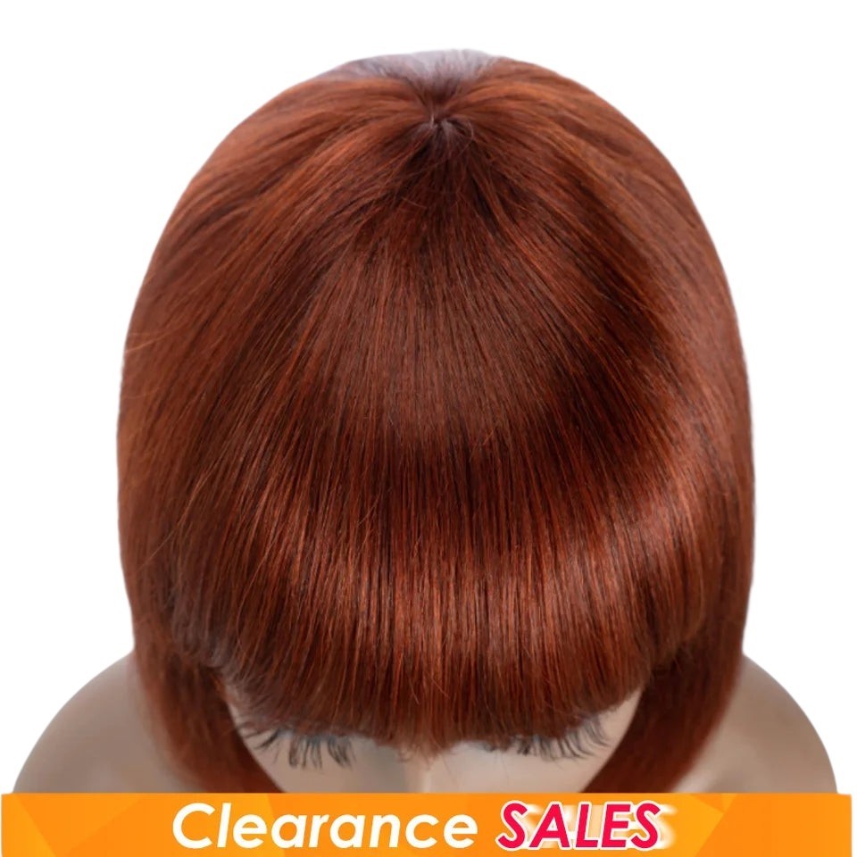 RitzWigs reddish brown straight human hair bob wig with bangs on a mannequin head
