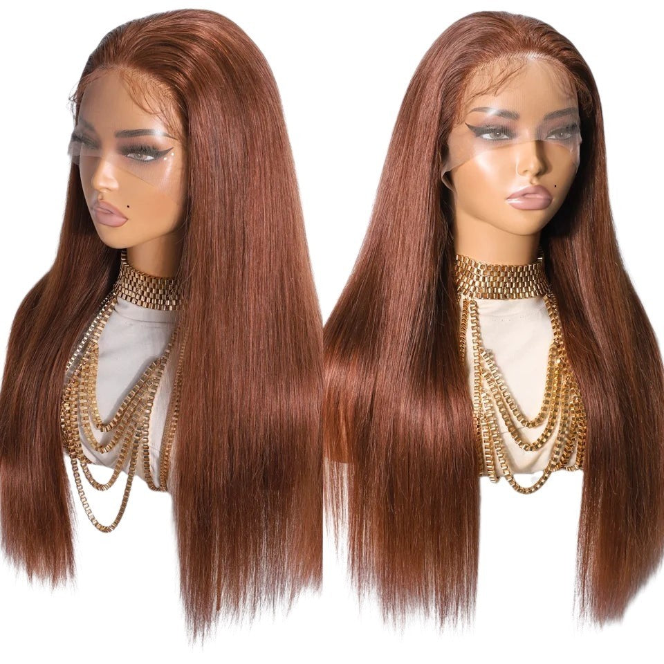 RitzWigs reddish brown straight human hair lace front wig on a mannequin wearing gold layered necklaces