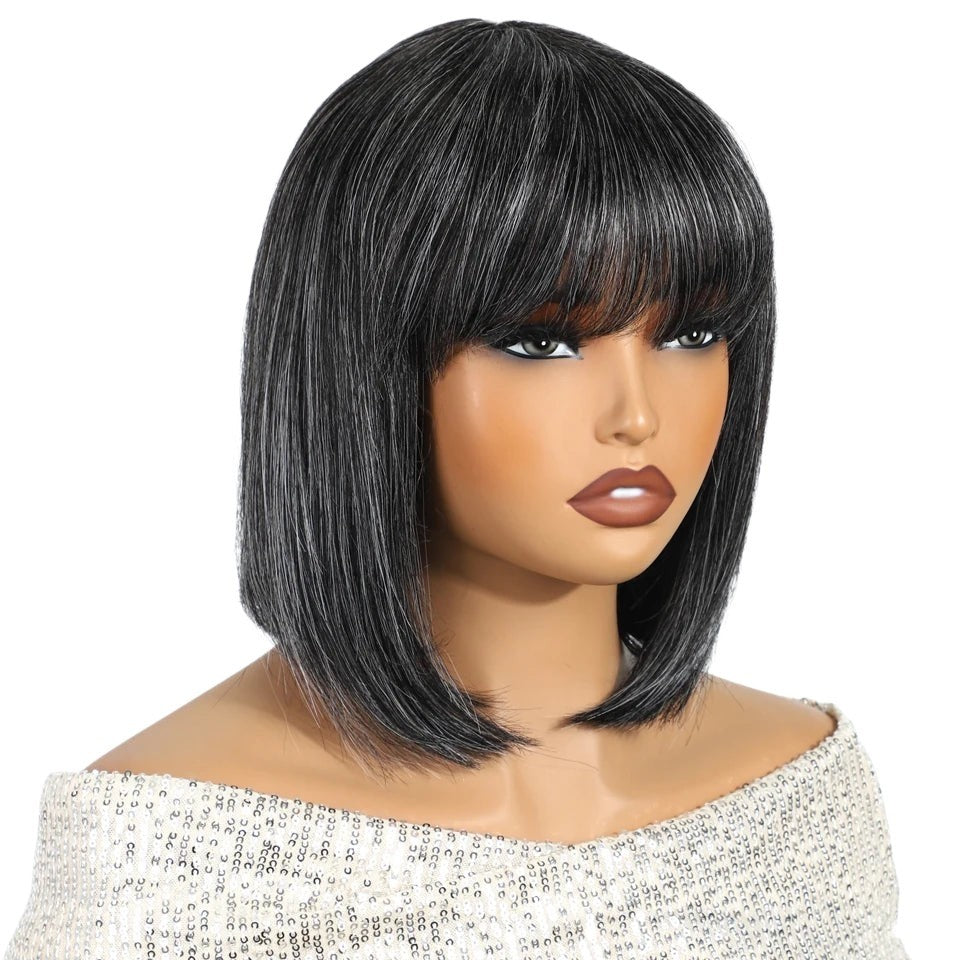 RitzWigs short straight bob wig in salt and pepper grey human hair with bangs on a mannequin head