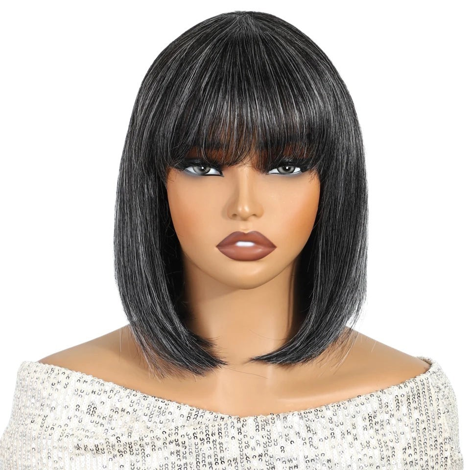 RitzWigs short straight salt and pepper bob human hair wig with bangs on a mannequin head