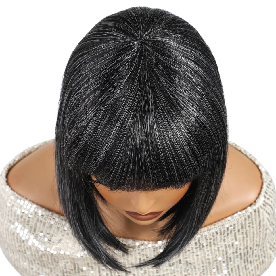 RitzWigs short straight salt and pepper bob wig with bangs on a mannequin head
