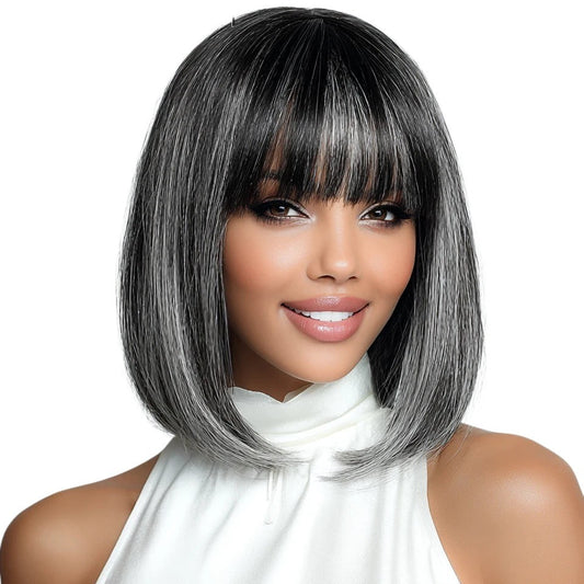 RitzWigs short straight salt and pepper bob wig with bangs on a model wearing a white high-neck top