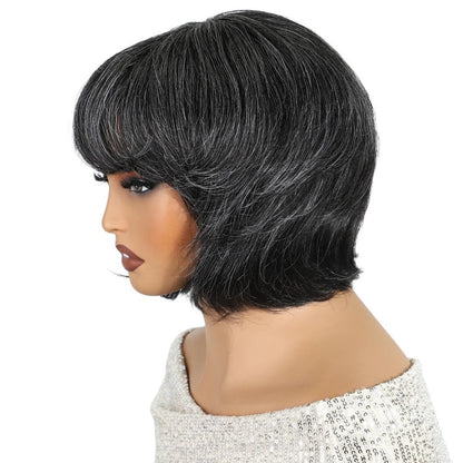 RitzWigs short salt and pepper gray pixie bob wig on a mannequin, featuring 100% human Remy hair with layered cut.