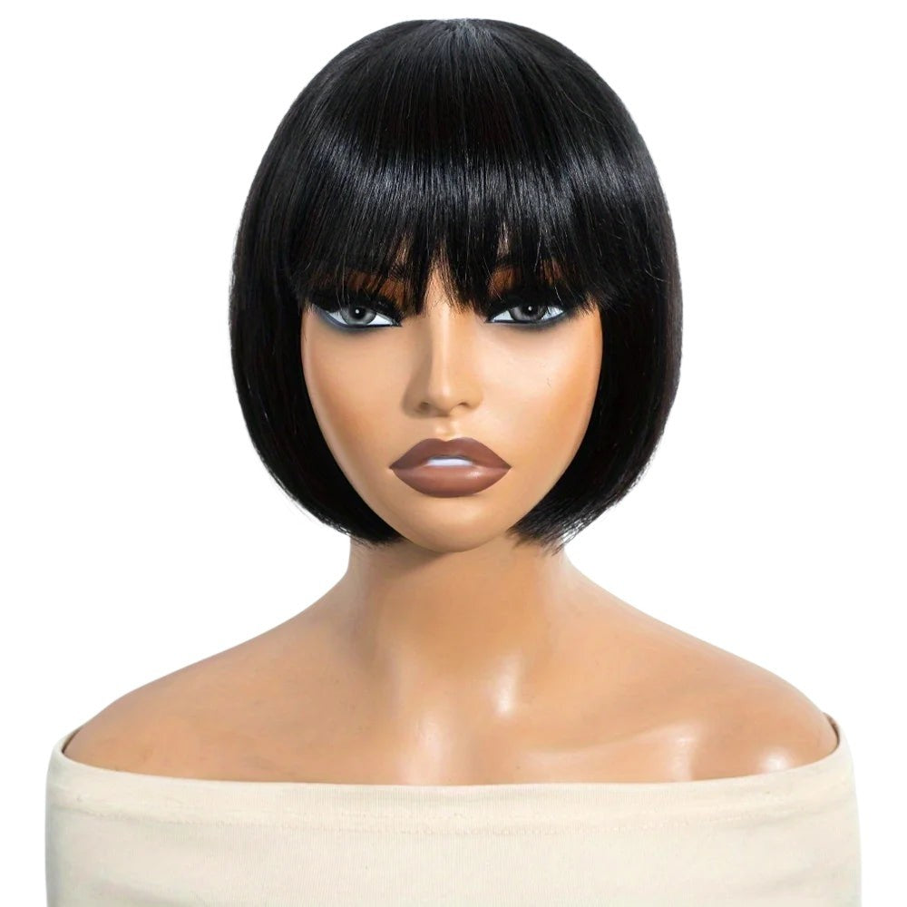 RitzWigs short black bob wig with bangs on a mannequin, made from straight Brazilian human hair.