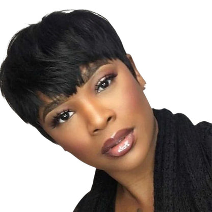 RitzWigs short black pixie cut bob wig with bangs on a woman, made from straight Brazilian Remy human hair.