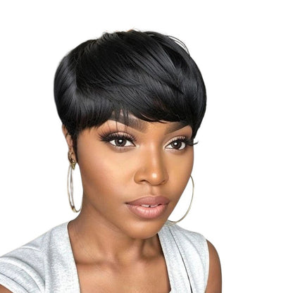 RitzWigs short black pixie cut human hair wig with bangs on a woman wearing large gold hoop earrings