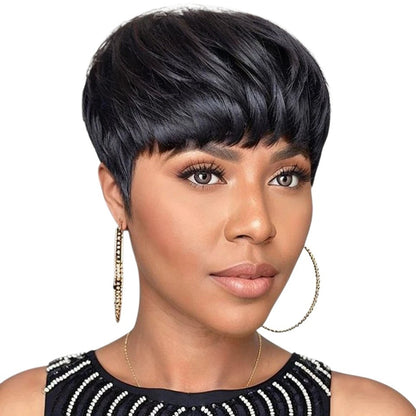 RitzWigs short black pixie cut human hair wig with bangs on a model wearing gold hoop earrings