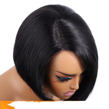 RitzWigs short black straight bob human hair wig with a side part on a mannequin head