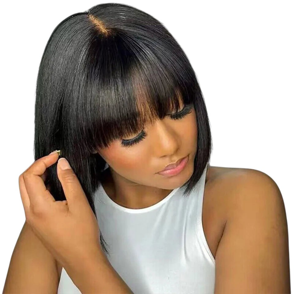 RitzWigs short black straight bob human hair wig with bangs and a natural middle part on a model