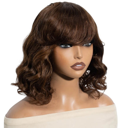RitzWigs short brown body wave bob human hair wig with bangs on a mannequin head