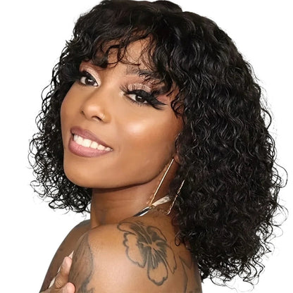 RitzWigs short black Jerry curly human hair bob wig with bangs on a smiling woman with shoulder tattoos