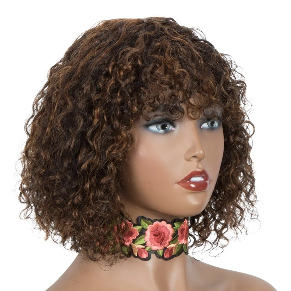 RitzWigs short kinky curly human hair wig with bangs in highlighted brown tones on a mannequin head