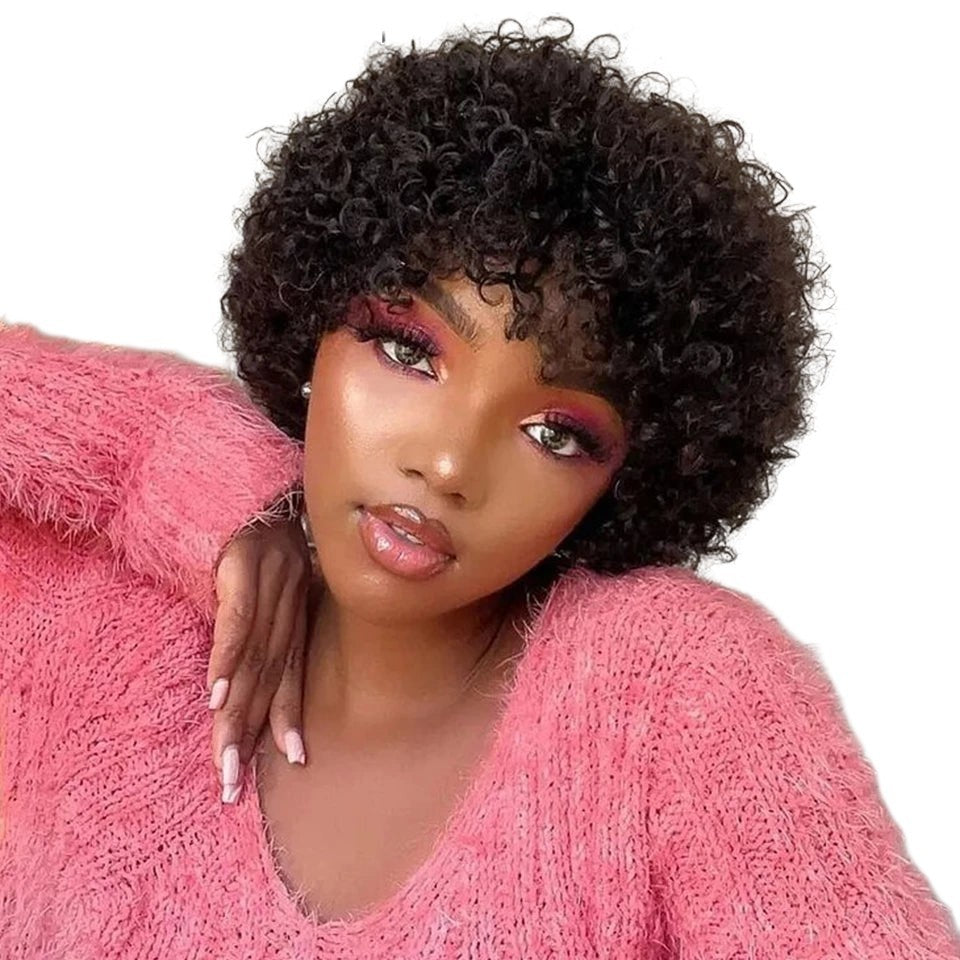 RitzWigs short natural brown afro kinky curly human hair pixie wig with bangs worn by a model